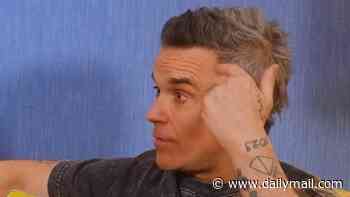 Robbie Williams, 52, reveals his insecurities over losing his hair and says he is considering getting a toupee