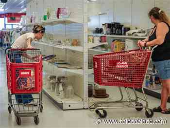 Cherry Street Mission cuts ribbon for new thrift store