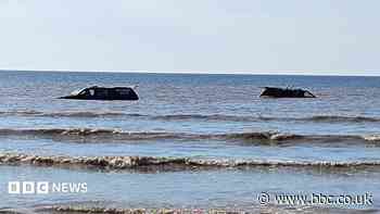 Rescue trucks stuck in sea after child rescue