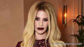 Kelly Osbourne, 41, nails gothic glamour in a lace dress as she poses with rugby player Oscar Wilson, 21, on night out - after split from Sid Wilson