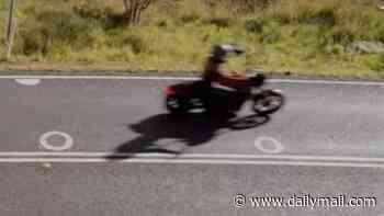 The story behind new circles on Aussie roads in trial to protect motorcyclists from other drivers