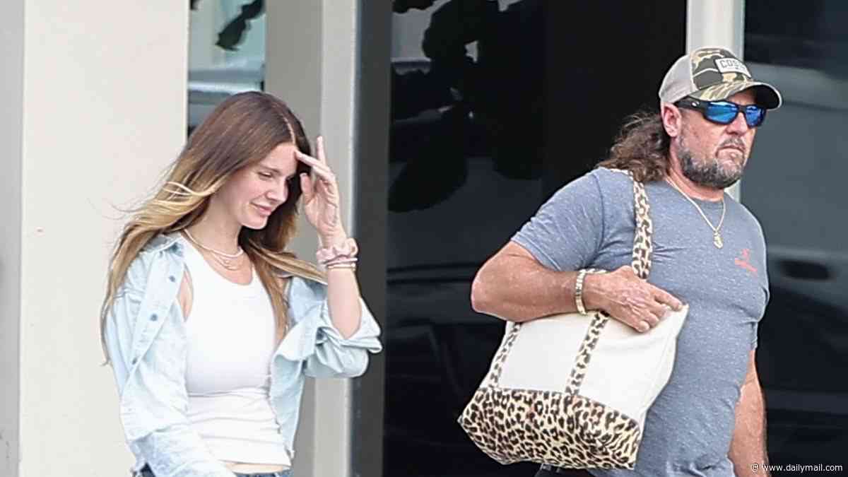 Lana Del Rey gets gator tour guide husband Jeremy Dufrene to carry her bag while shopping before anniversary