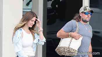 Lana Del Rey gets gator tour guide husband Jeremy Dufrene to carry her bag while shopping before anniversary
