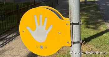 Aha: dit betekenen dus die gele bordjes met grijze hand erop in Apeldoorn