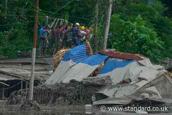 Rescuers urged to remain on high alert after dam bursts banks again in Nepal