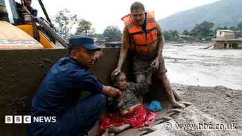 People pulled from mud in Nepal after deadly flash floods