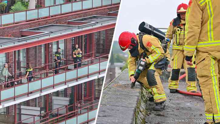 Brand in spouwmuur flat woedt voort: tweede hoogwerker ingezet