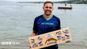Swimmer completes challenge to cross 10 lakes