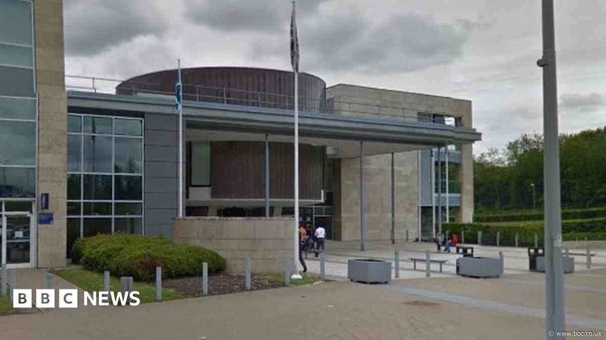 Man jailed for driving van at four police officers