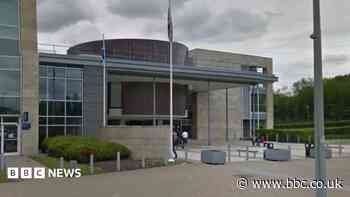 Man jailed for driving van at four police officers