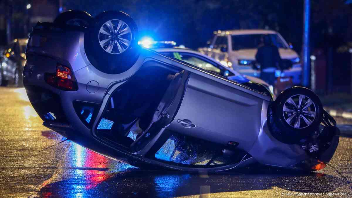 Car flips and lands on roof after crash with milk float in Denton