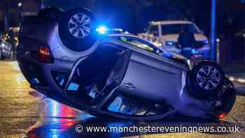 Car flips and lands on roof after crash with milk float in Denton