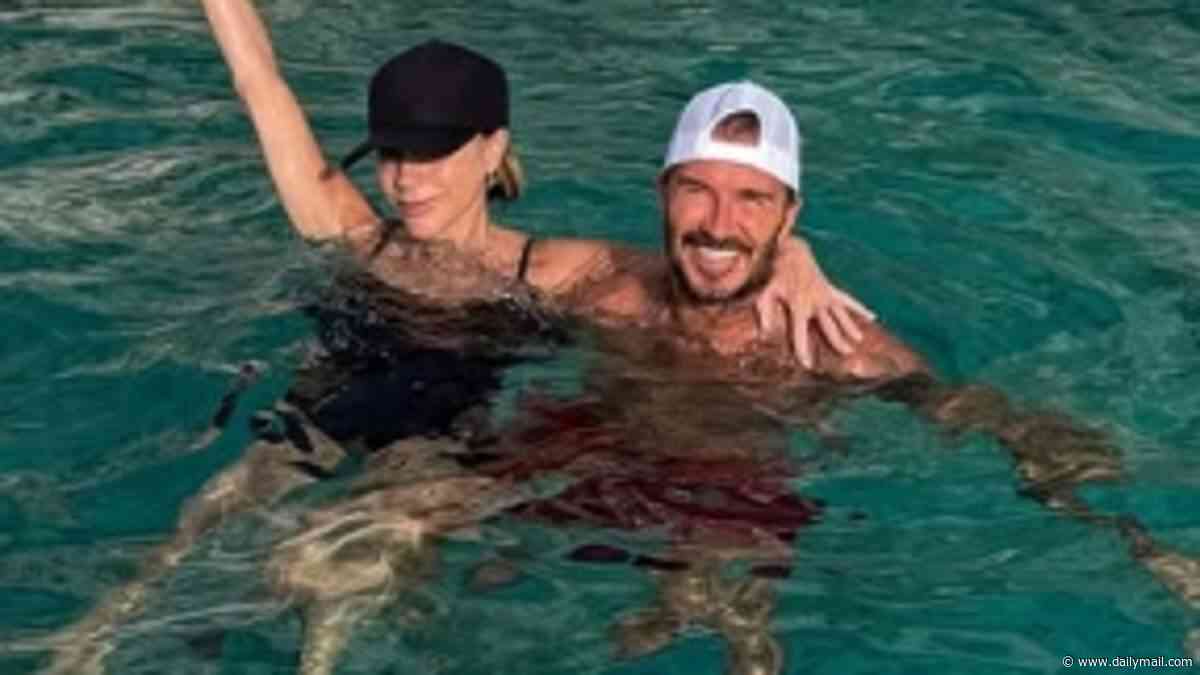 David Beckham shares rare smiling picture of swimsuit-clad wife Victoria frolicking in the sea before passionately kissing during snapshots from their European trip