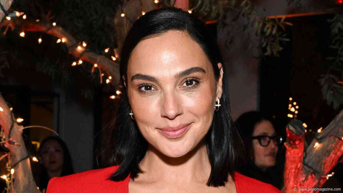 Gal Gadot turns up the heat in dangerously plunging red dress at star-studded party