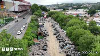 'We live and work next to a huge illegal waste dump'