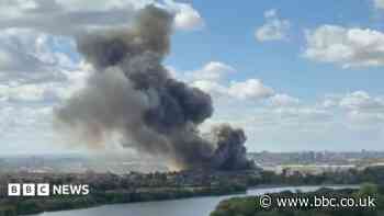 Huge waste facility fire shuts Tube and train lines
