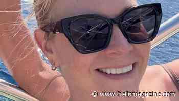Beach-bound Melissa Joan Hart goes wild in tiny blue bikini to celebrate huge milestone