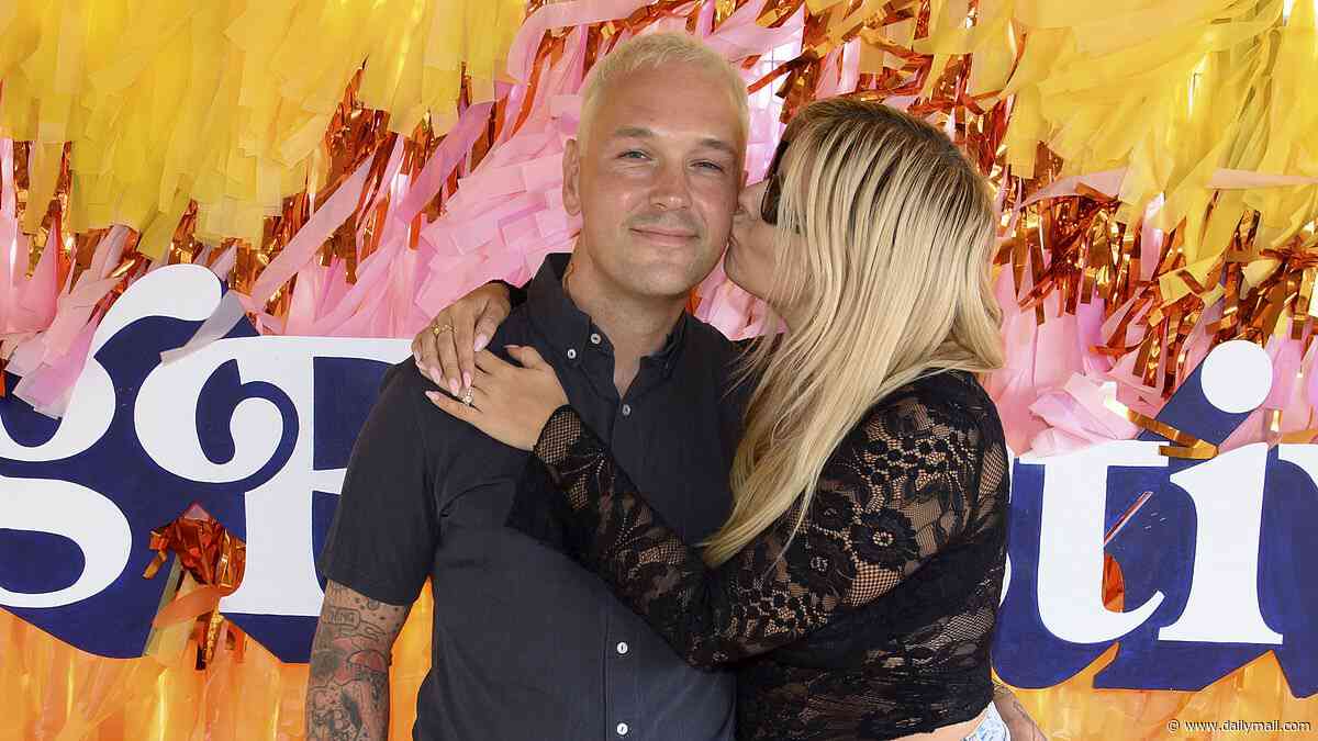 Ordinary Boys star Preston gets a kiss from new fiancée Chloe Griffin on their first public outing together at Big Feastival and she's a dead ringer for his CBB ex wife Chantelle Houghton