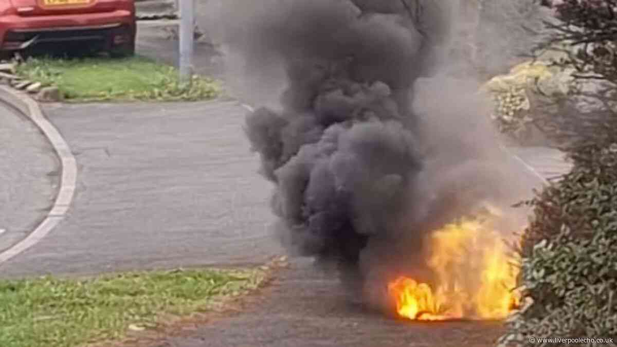 Moment manhole cover goes up in flames on Whiston road
