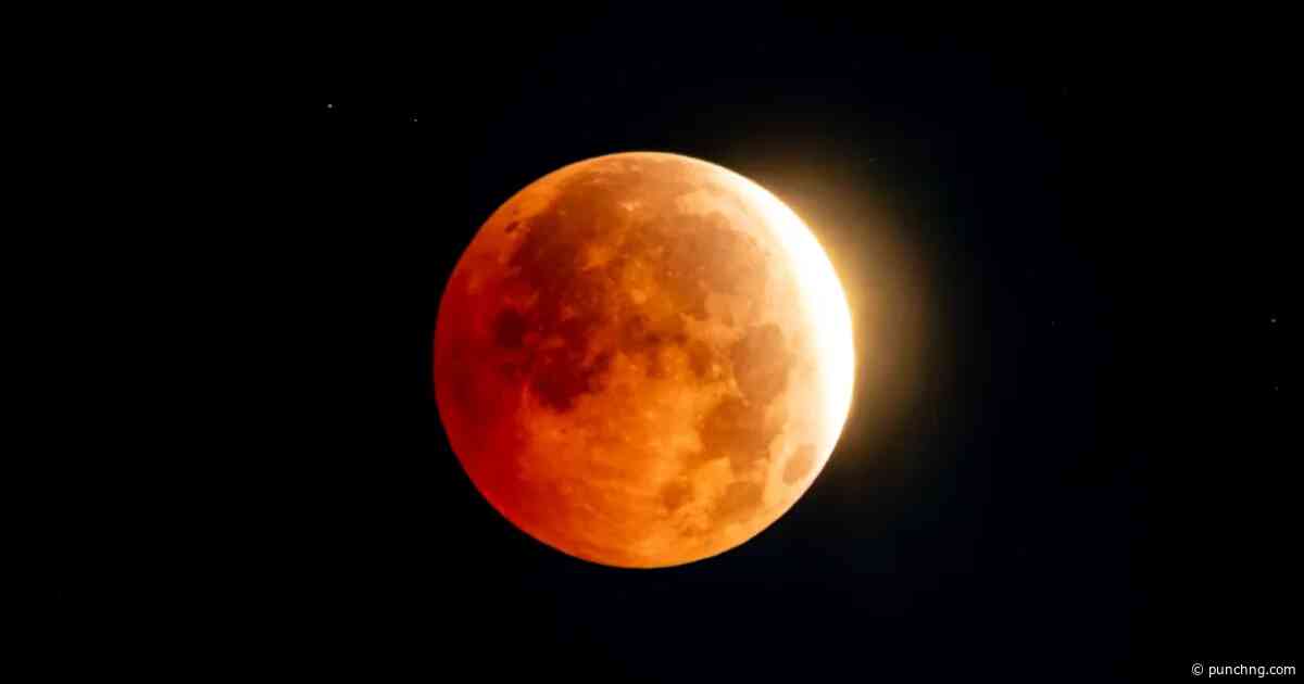 PHOTOS: Rare lunar eclipse turns moon deep red, 96% covered
