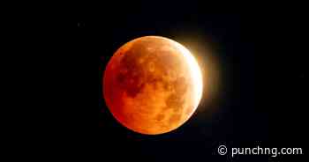 PHOTOS: Rare lunar eclipse turns moon deep red, 96% covered