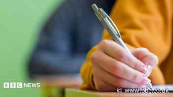 Teacher banned over pen with hidden camera