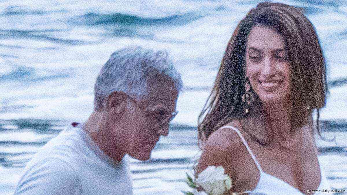 George Clooney's wife Amal wows in slinky white dress on romantic Lake Como date night... after evacuating their home in France