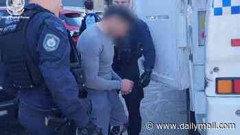 Man charged a year after daylight kebab shop shooting in Sydney that targeted a notorious underworld figure