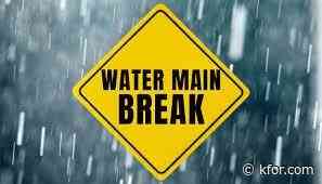 Crews work on water main break near May & Britton