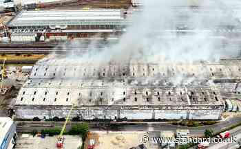 Cause of huge fire near Wembley Stadium under investigation as Tube and rail chaos remains