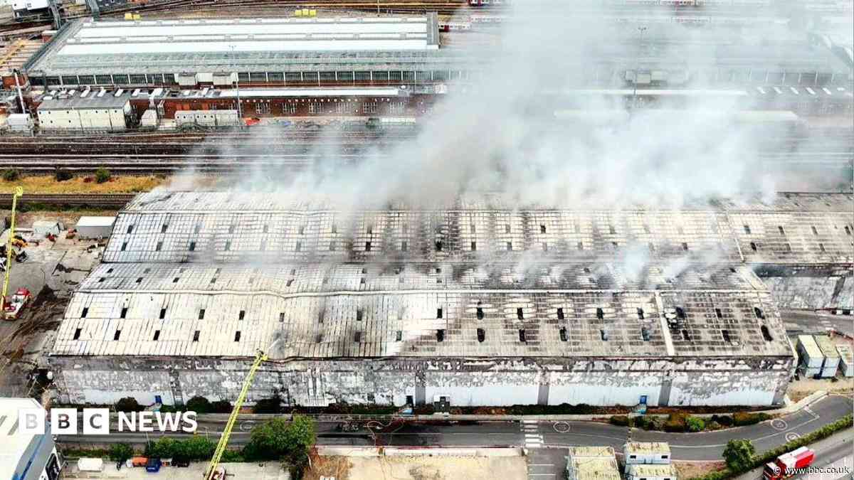 Huge waste facility fire shuts Tube and train lines