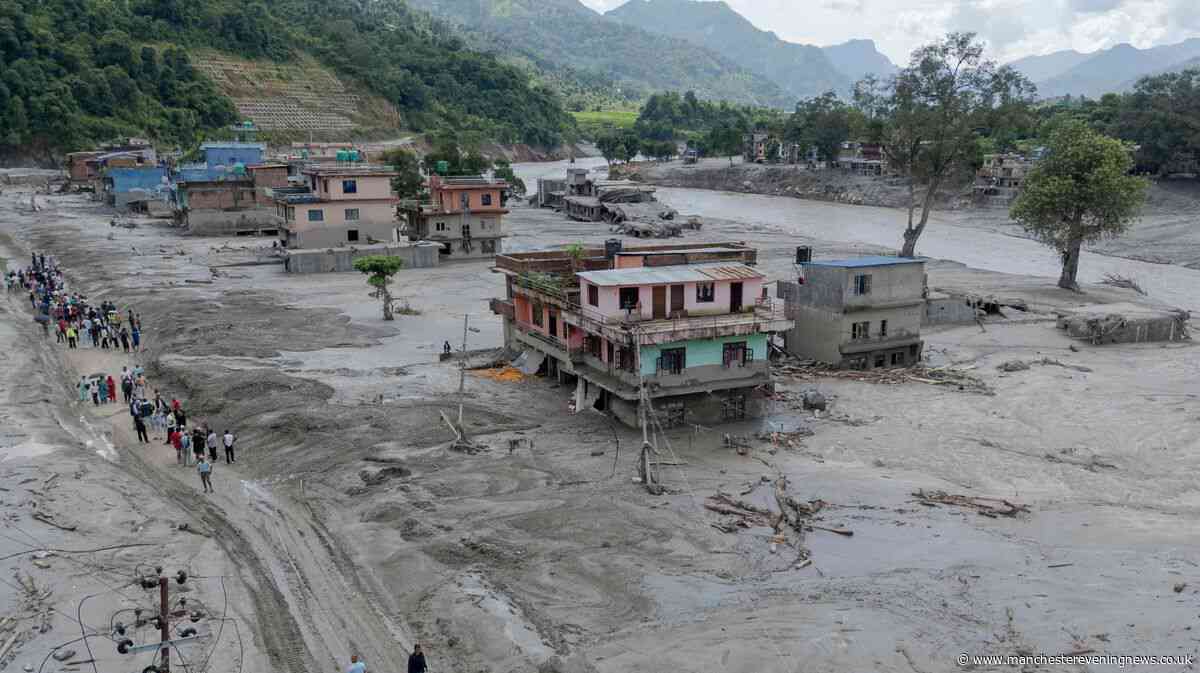 Death toll from 'tsunami from the sky' flooding disaster in Nepal passes 600