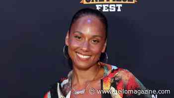 Bikini-clad Alicia Keys highlights her curvaceous figure in stunning summer photos