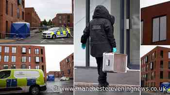 Man fights for life following Salford flats balcony plunge horror as police question attempted murder suspect