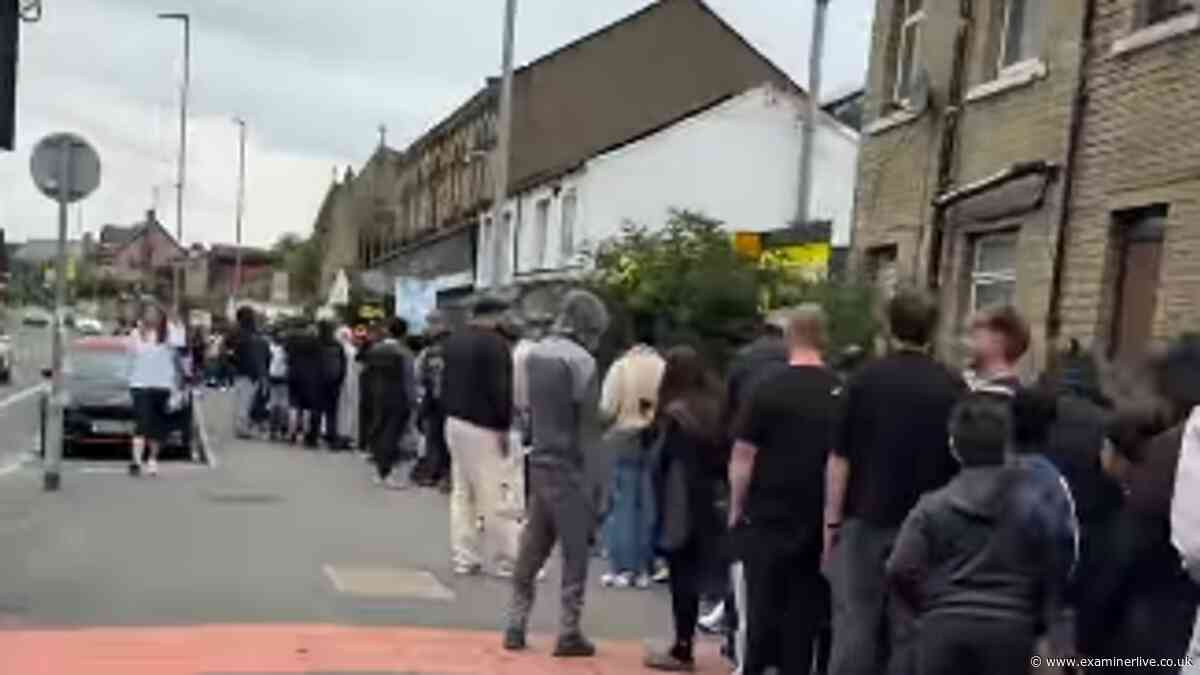 Queues stretch through Huddersfield since 5am as fans flock to be first in new shop
