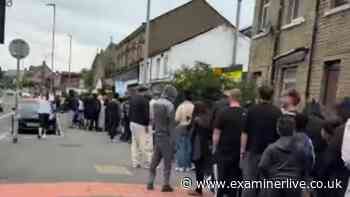 Queues stretch through Huddersfield since 5am as fans flock to be first in new shop