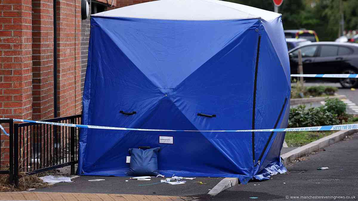 Shock on Salford street following horror balcony fall as attempted murder probe launched