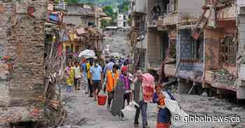Nepal flood survivors reach safe areas as families await news of missing