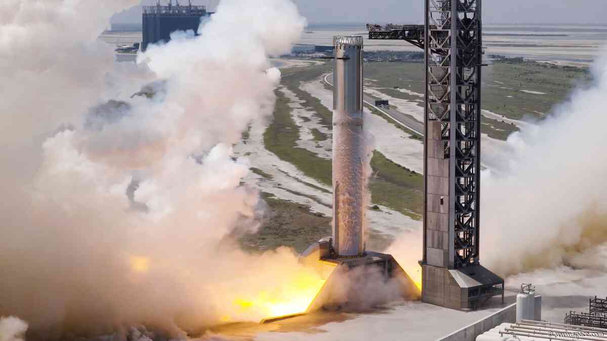 SpaceX test-fires Starship Super Heavy booster ahead of critical Flight 14