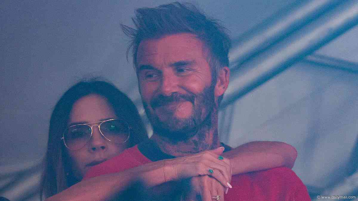 Proud parents David and Victoria Beckham cheer on son Cruz and his band The Breakers as they make their Reading debut as the whole family watch from backstage