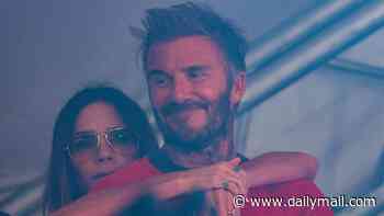 Proud parents David and Victoria Beckham cheer on son Cruz and his band The Breakers as they make their Reading debut as the whole family watch from backstage
