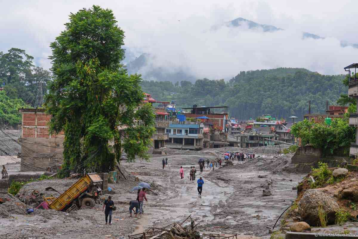 Flooding death toll tops 670 as UK rapid response team heads to Nepal