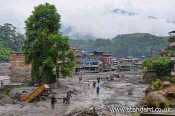 Flooding death toll tops 670 as UK rapid response team heads to Nepal