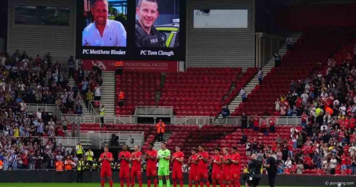 Football fans pay tribute to two officers killed in crash
