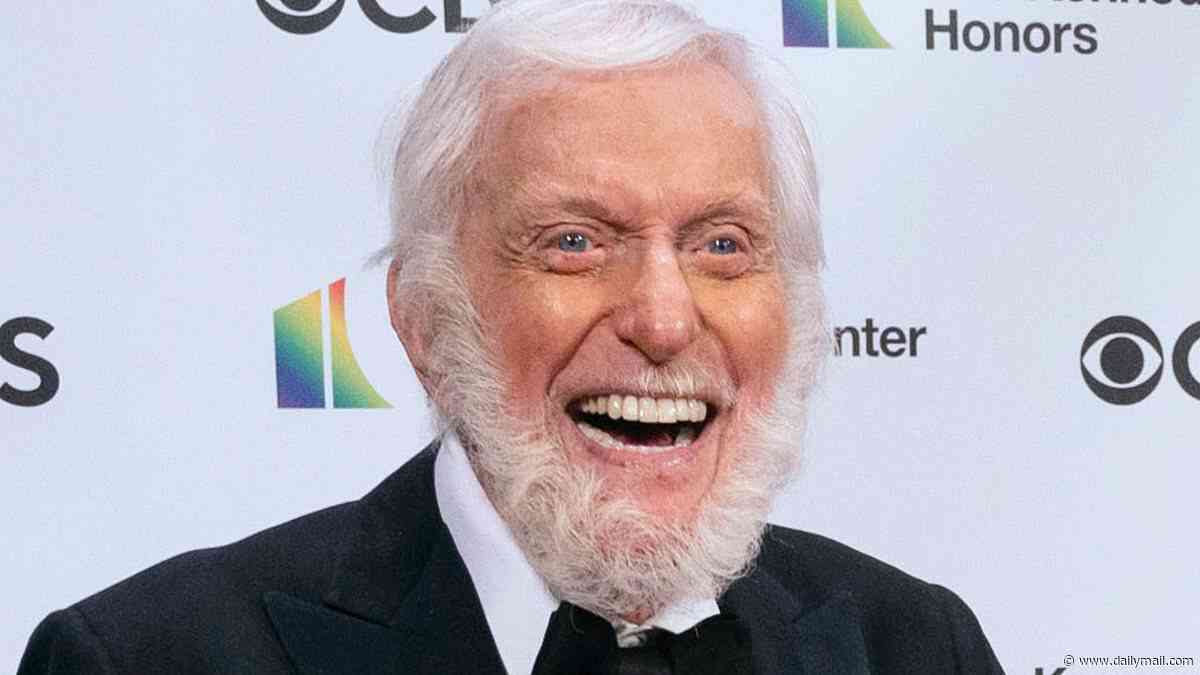 Dick Van Dyke, 100, works out UPSIDE DOWN in new video as he urges fans to 'keep moving'
