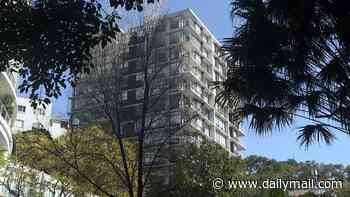 Man plunges to his death after falling eight storeys at apartment complex in Elizabeth Bay