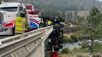 WATCH:  18-wheeler outside California's Lake Tahoe left dangling from overpass after crash