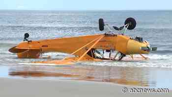 WATCH:  Pilot rescued after banner plane crashes into Florida surf