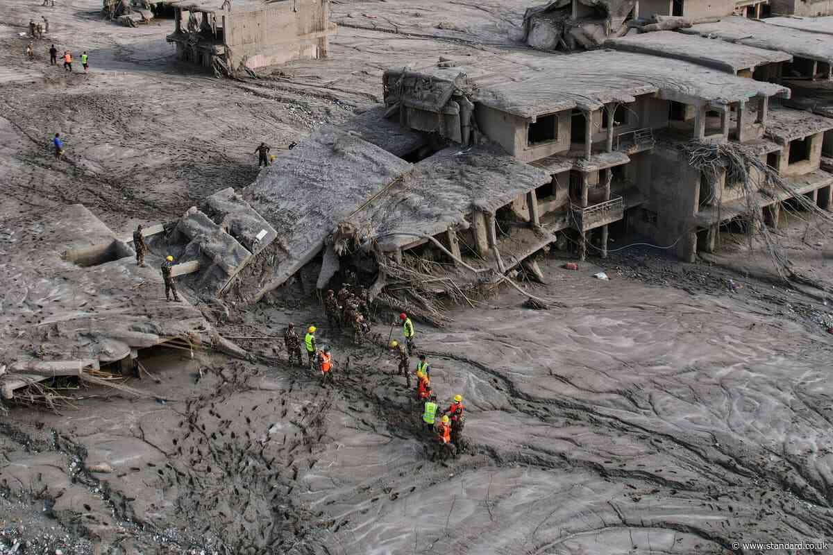 Searches continue for thousands missing as death toll tops 700 after Nepal flood
