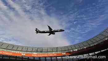 Moment two airliners nearly hit packed stadium in 'dangerous' pre-game flyover is caught on camera